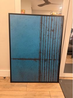 Artwork on canvas with black frame 38 inches wide by 50 inches height