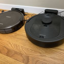 2 Sparsely Used Robo Vacuums 