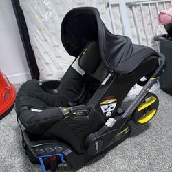 Doona Baby Car Seat/Stroller.
