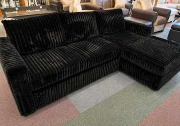 black corduroy Sectional Sofa. Comes new in the box.