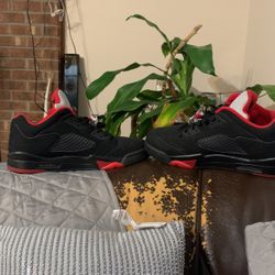 Black n Red low cut Jordan 5s size 14