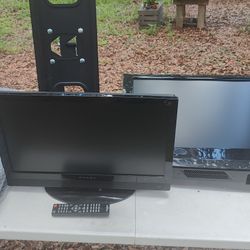 3 Tvs and  A Tv Rack Holder ..