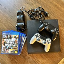 PS4 With 2 Controllers, Charging Station And 5 Games