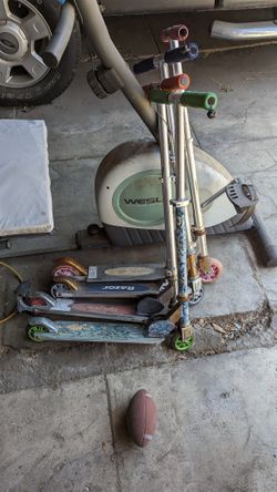 2 Huffy Bike/5 Razor Scooters/ 1 Razor Tricycle $60