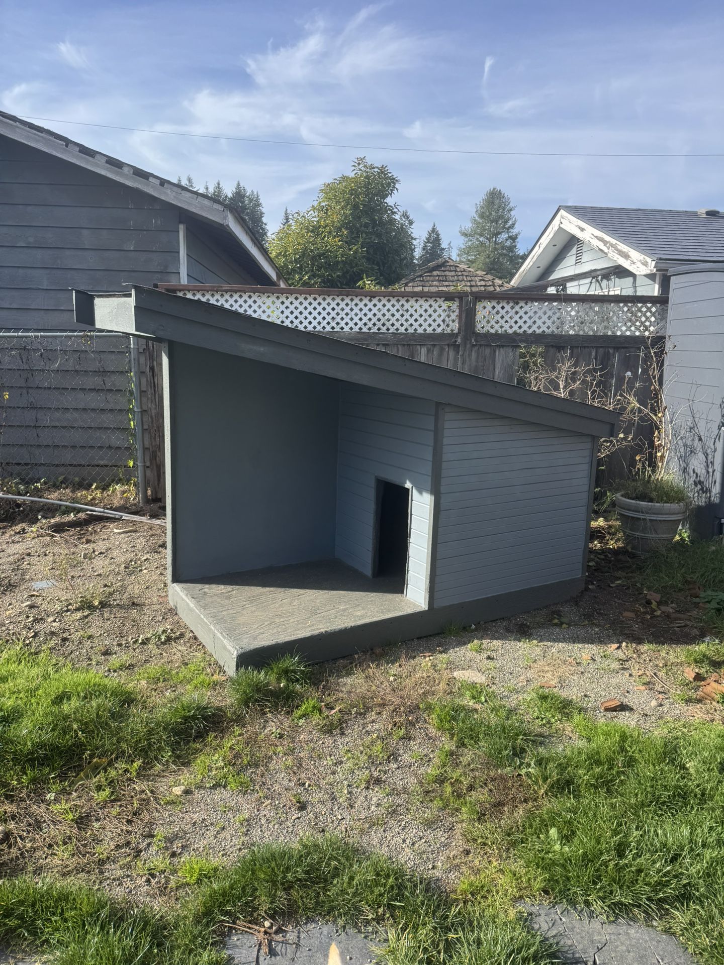 A Very Large And Sturdy Wooden Dog House 