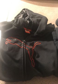 2 youth sweaters. Under armour & puma XL