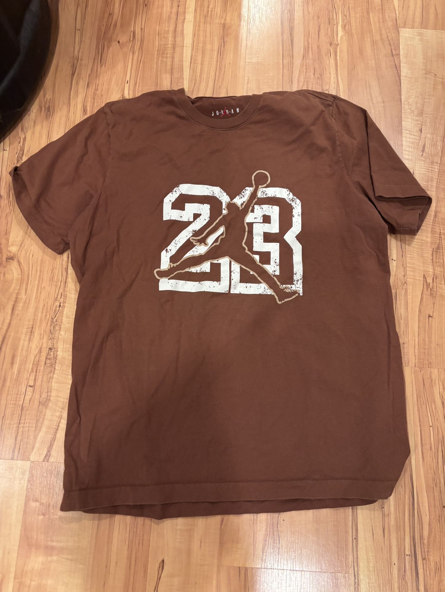 Nike Air Jordan T-Shirt Size Large. Located in Murray cash/Venmo. Will hold with Venmo