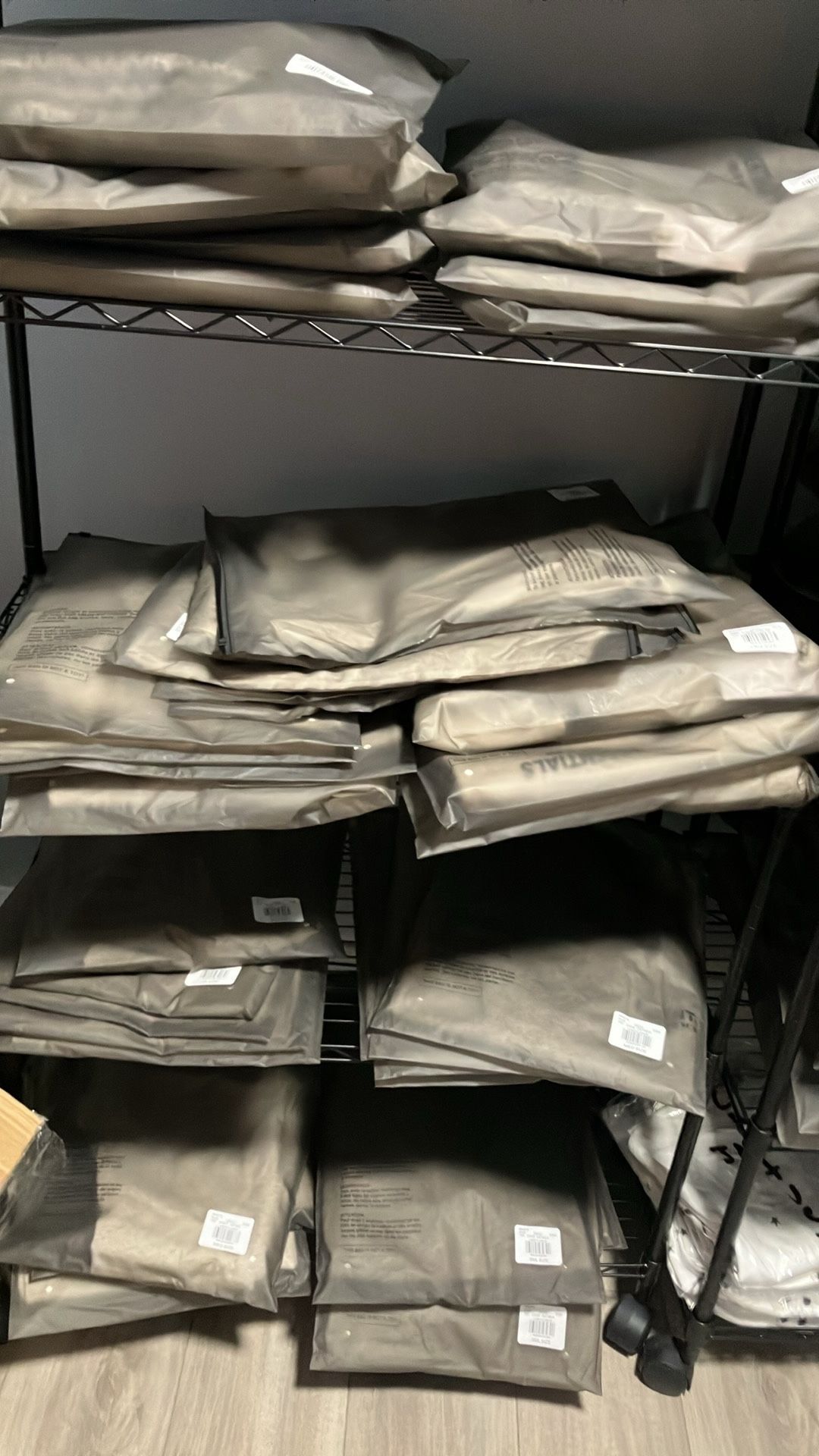 lot of essentials tees