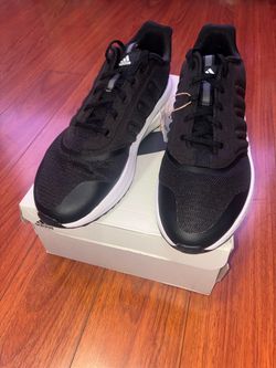 Size 11, men’s brand new unworn Adidas shoes with tags and box