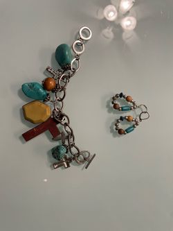 Bulky dangling turquoise and brown cross necklace with earrings