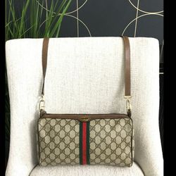 crossbody bag Classic monogram coated canvas with brown leather.