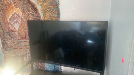 tv with purple leds on the back
