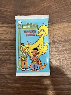 SESAME ST AND POKÉMON TRADING CARDS.