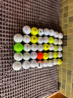 39 used golf balls mixed