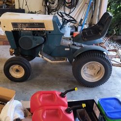 Seats Suburban 12HP Heavy Duty Lawn/Garden Tractor. 