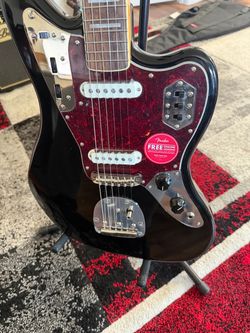 Squire Jaguar. Mint condition with factory case.