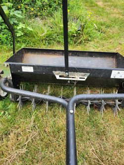 Pull Behind Aerator/seed spreader