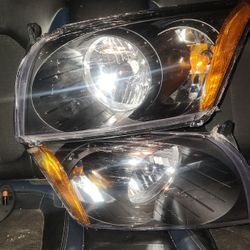 Brand New Headlight Enclosures 2007-2012 Caliber