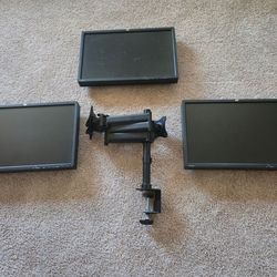 3 HP Monitors with Triple arm mount.