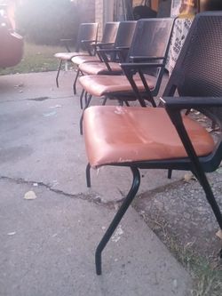 5 black modern chairs