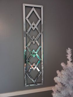 Glass and metal framed decor