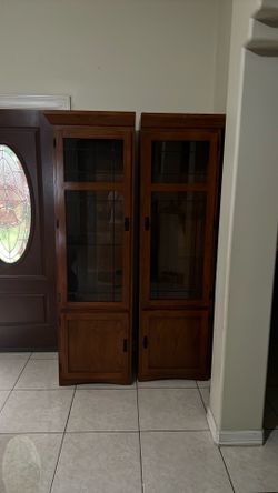2 corners cabinets, 1 sofa and a 3 setting light lamp. All items for $170