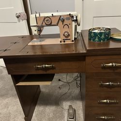 Nelco sewing machine and cabinet 