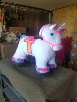 NEW ELECTRIC KIDS RIDE ON UNICORN