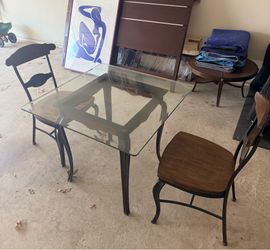 Glass top dining room table & 4 chairs