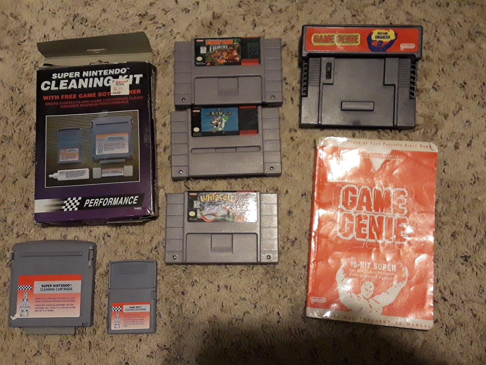 SNES games game genie and cleaning kit