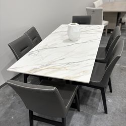 Modern Marble Dining Room With gray Chairs