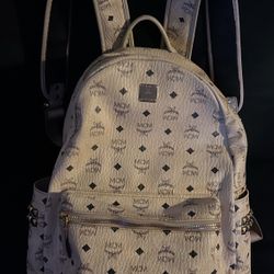 Beige MCM backpack 