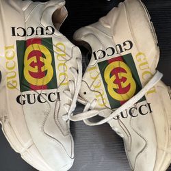 Gucci Shoes worn a couple times still has life to em