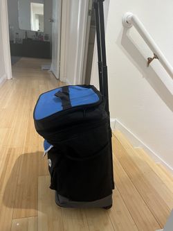 Cooler On Wheel - Easy To Store when Not In Use. 