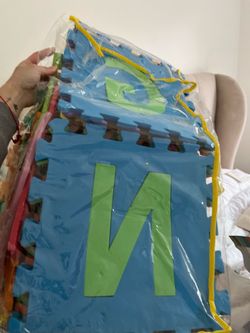 Baby Rubber Letter Matts! Has a ton of extra ones in the bags