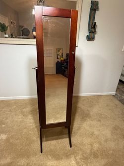 Walnut jewelry cabinet