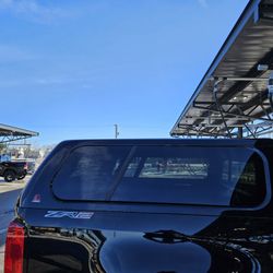 Camper. Bed Cap Leer