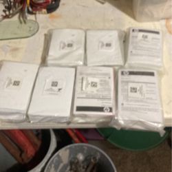 Seven. Bundles of photo paper.