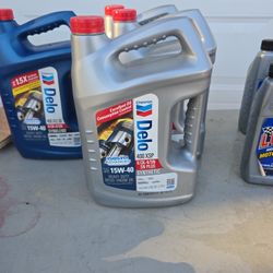 3 1 gallon bottles of 15w40 Delo Oil 