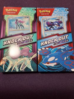 Sealed Pokémon Knock Out Collection boxes featuring Kyogre and Suicune +2 boosters
