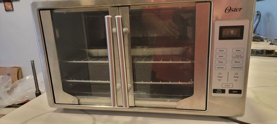 Oster 6-slice Stainless Steel Toaster Oven for Sale in New York, NY -  OfferUp