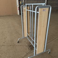 ~35 Rolling Retail Racks Of Different Types And Sizes 