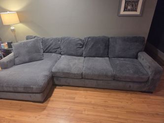 Blue gray sectional with chaise lounge
