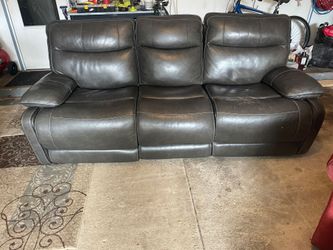 Free Dark brown leather couch