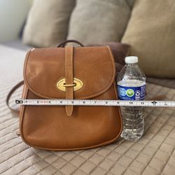 Dooney&bourke small tan leader backpack . Can only meet on East Side.