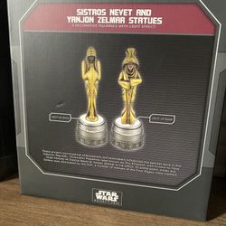 Sistros Nevet & Yanjon Zelmar Statues