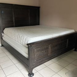Beautiful Dark Wood King Bed Frame with Purple Mattress