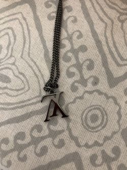 Louis Vuitton upside down necklace! new never worn for Sale in Anaheim, CA  - OfferUp
