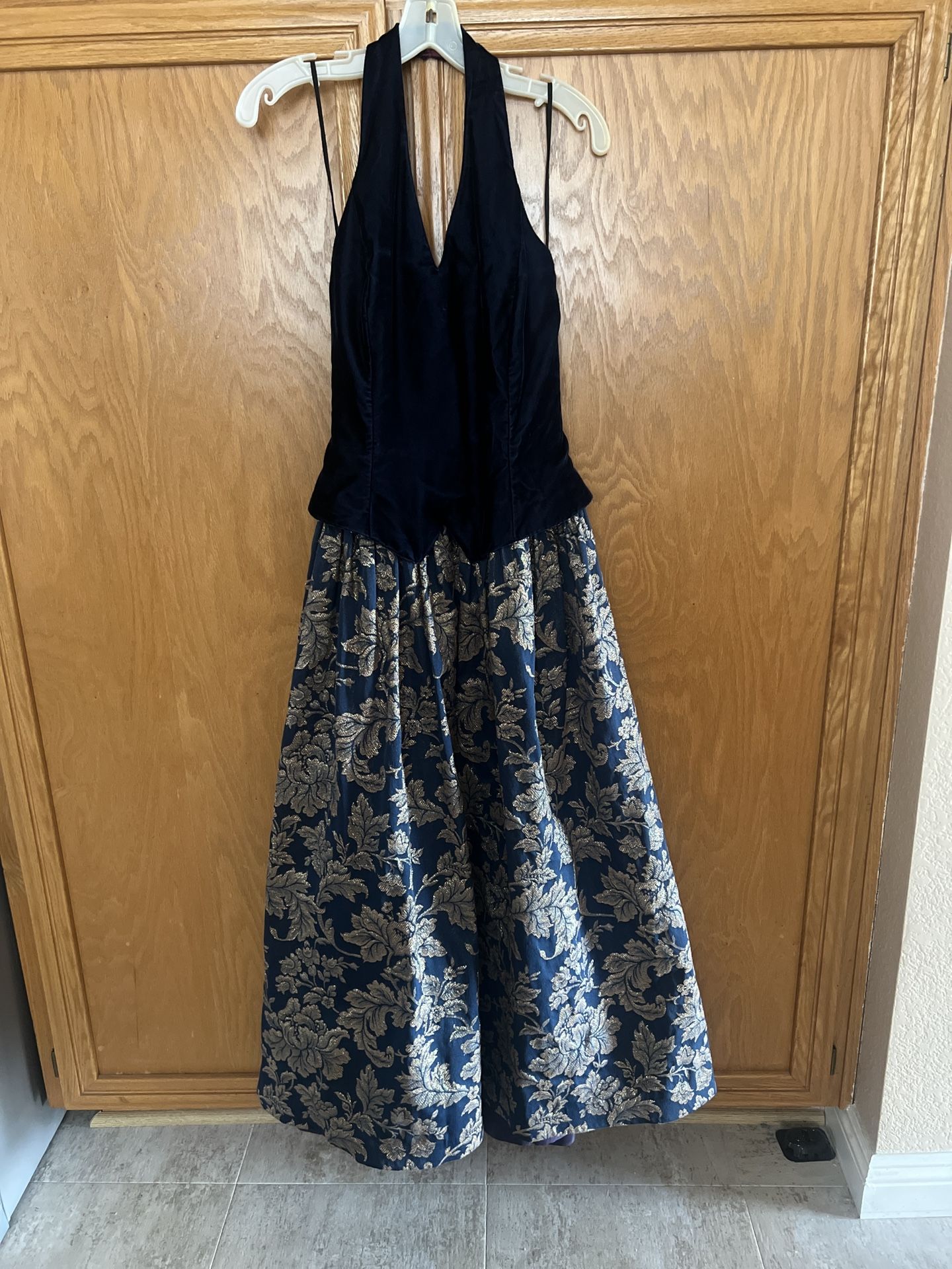vintage 90s Jessica McClintock formal dress with a blue velvet halter top and a gold brocade floral skirt