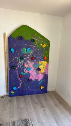 Climbing wall with holders